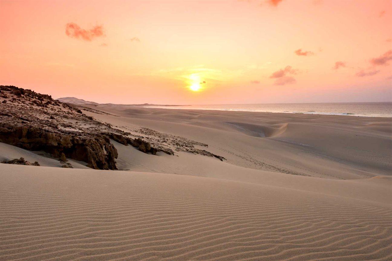 Sunset over quiet Boa Vista dunes and Atlantic beach